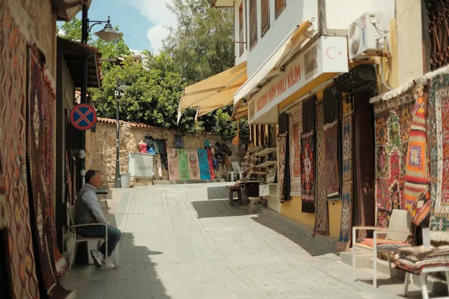 A quiet street lined with carpet shops